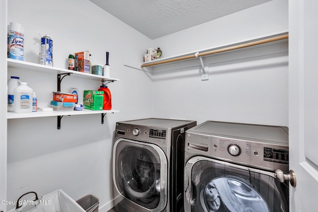 3631 N Britton Rd, Post Falls, ID 83854 - laundry room with washing machine and clothes dryer and a textured ceiling