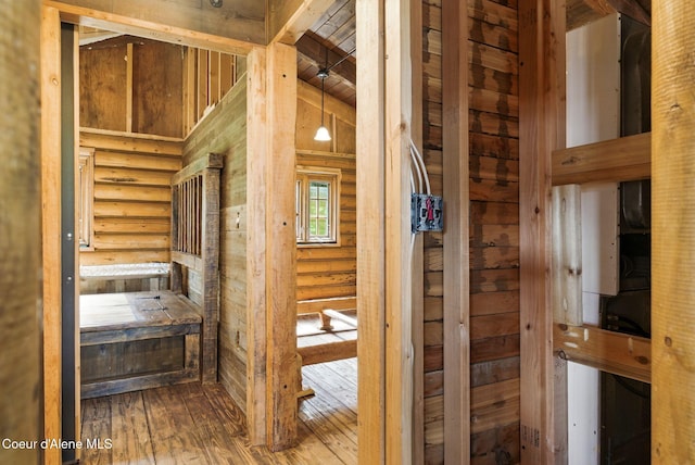 527 W Seneacquoteen, Priest River, ID 83856 - bathroom with hardwood / wood-style flooring, log walls, beamed ceiling, and high vaulted ceiling
