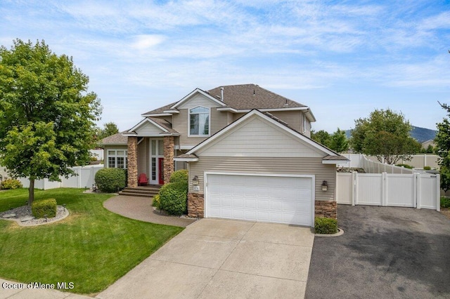 8136 Salmonberry Lp, Hayden, ID 83835 - traditional home featuring stone siding, concrete driveway, and a garage