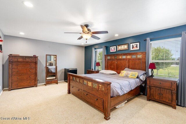 8136 Salmonberry Lp, Hayden, ID 83835 - bedroom featuring light carpet, recessed lighting, and a ceiling fan