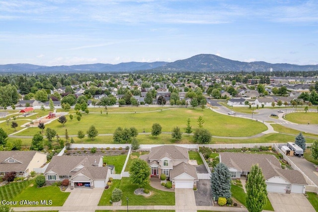 8136 Salmonberry Lp, Hayden, ID 83835 - aerial perspective of suburban area with a mountainous background
