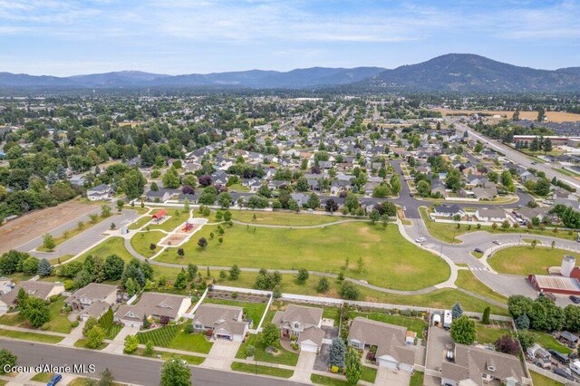 8136 Salmonberry Lp, Hayden, ID 83835 - aerial view of property and surrounding area with mountains