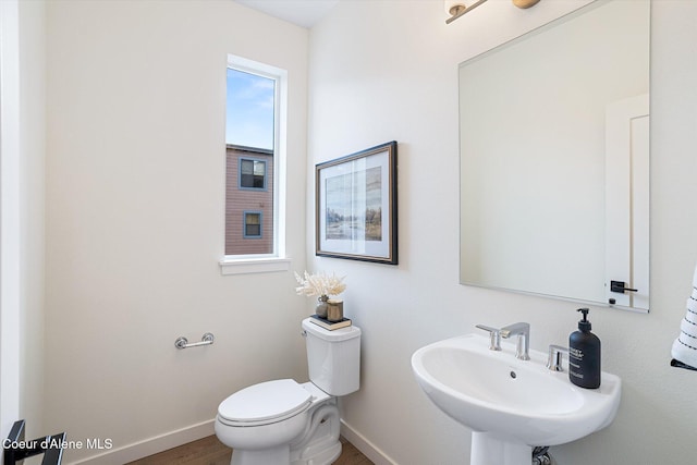 2756 W Lumber Ln Unit 7, Coeur Dalene, ID 83814 - half bath with a sink and wood finished floors