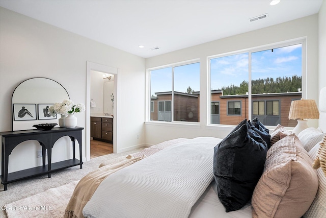 2756 W Lumber Ln Unit 7, Coeur Dalene, ID 83814 - bedroom with recessed lighting and ensuite bath