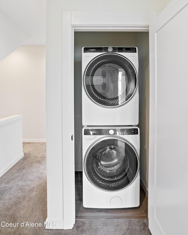 2756 W Lumber Ln Unit 7, Coeur Dalene, ID 83814 - laundry room with estacked washer and dryer and carpet flooring