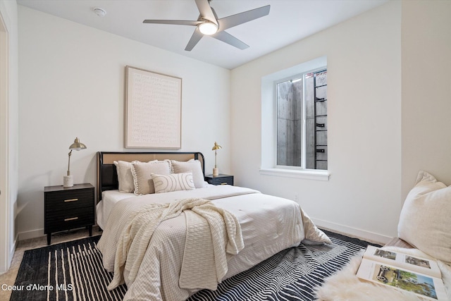 2756 W Lumber Ln Unit 7, Coeur Dalene, ID 83814 - bedroom featuring baseboards and a ceiling fan