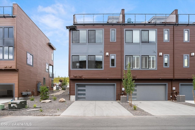 2756 W Lumber Ln Unit 7, Coeur Dalene, ID 83814 - view of front of house featuring a garage and driveway