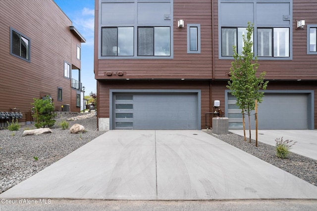 2756 W Lumber Ln Unit 7, Coeur Dalene, ID 83814 - view of front facade with an attached garage and concrete driveway