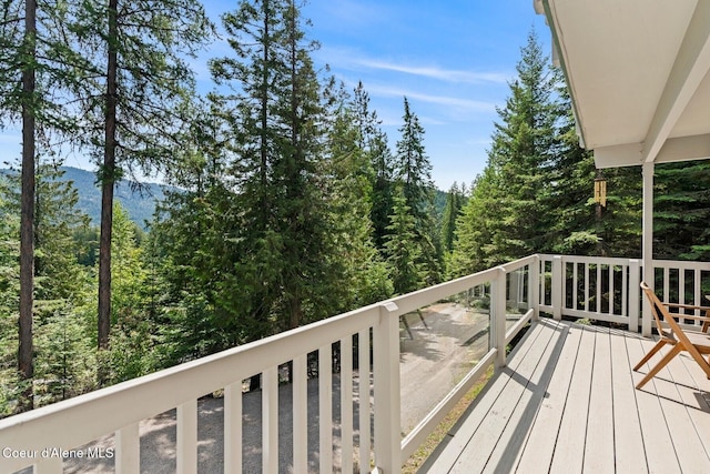 38 S Quail Run Unit B, Sandpoint, ID 83864 - wooden terrace with a view of trees