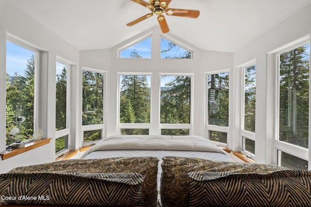 38 S Quail Run Unit B, Sandpoint, ID 83864 - sunroom featuring healthy amount of natural light, vaulted ceiling, and wood finished floors