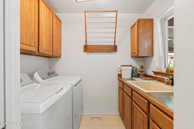 38 S Quail Run Unit B, Sandpoint, ID 83864 - washroom featuring washer and dryer and cabinet space