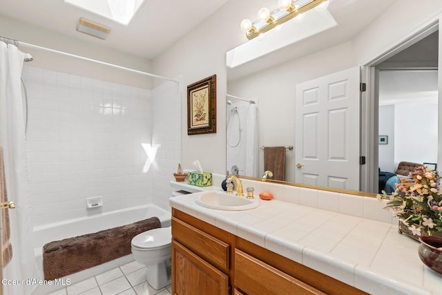 38 S Quail Run Unit B, Sandpoint, ID 83864 - bathroom featuring vanity, shower / bath combination with curtain, tile patterned floors, and a skylight