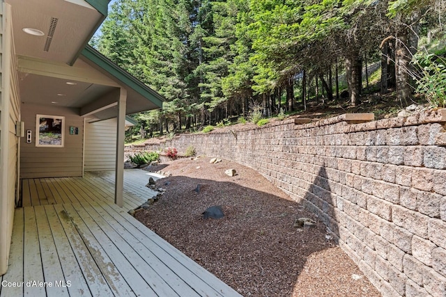 38 S Quail Run Unit B, Sandpoint, ID 83864 - view of yard featuring a wooden deck