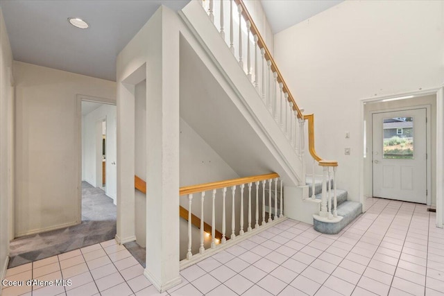 2699 E Packsaddle Dr, Coeur Dalene, ID 83815 - foyer entrance with tile patterned floors and stairs