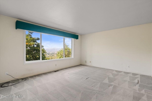2699 E Packsaddle Dr, Coeur Dalene, ID 83815 - spare room with light colored carpet and baseboards