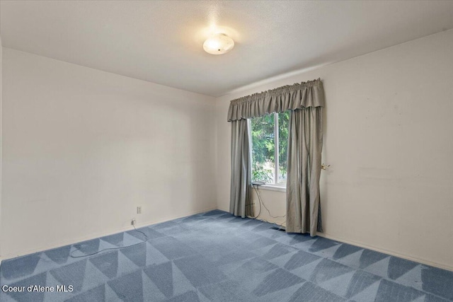 2699 E Packsaddle Dr, Coeur Dalene, ID 83815 - spare room featuring carpet flooring