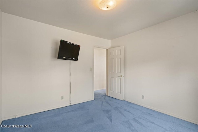 2699 E Packsaddle Dr, Coeur Dalene, ID 83815 - unfurnished bedroom featuring carpet and baseboards