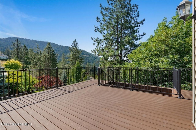 2699 E Packsaddle Dr, Coeur Dalene, ID 83815 - wooden terrace featuring a mountain view