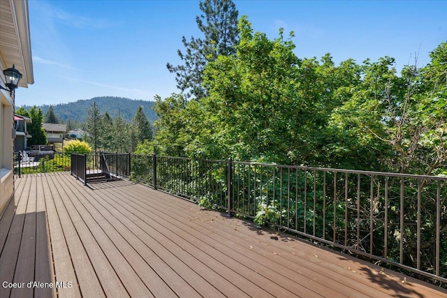 2699 E Packsaddle Dr, Coeur Dalene, ID 83815 - wooden terrace with a mountain view