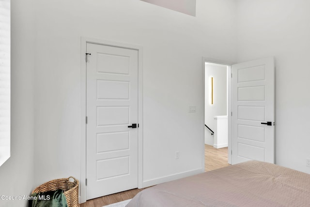 114 E Hattie, Coeur Dalene, ID 83814 - bedroom featuring light wood-type flooring