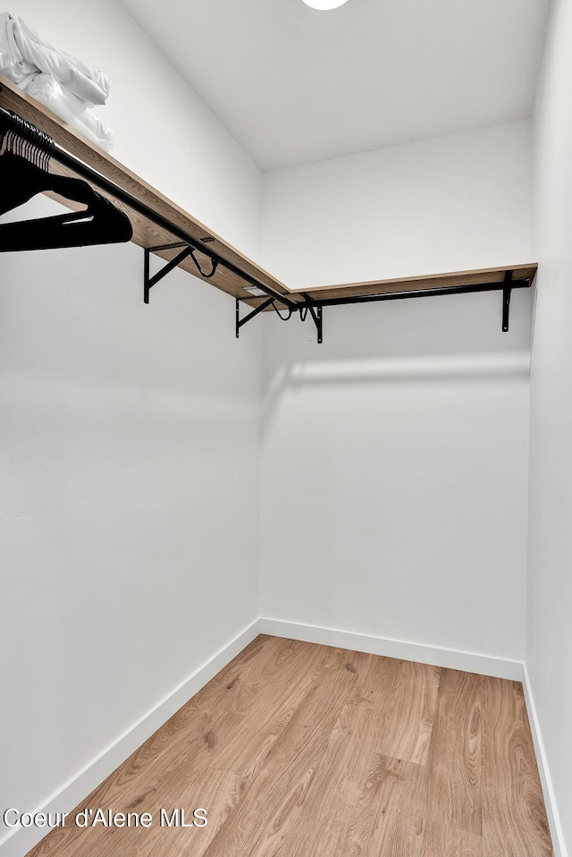 114 E Hattie, Coeur Dalene, ID 83814 - spacious closet featuring light wood-type flooring