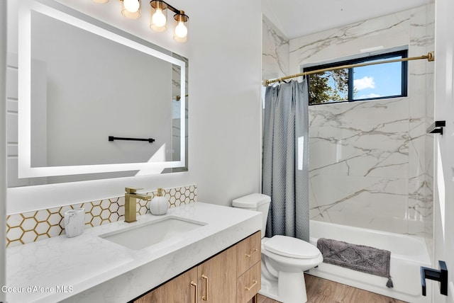 114 E Hattie, Coeur Dalene, ID 83814 - bathroom featuring vanity, shower / bathtub combination with curtain, tasteful backsplash, and wood finished floors