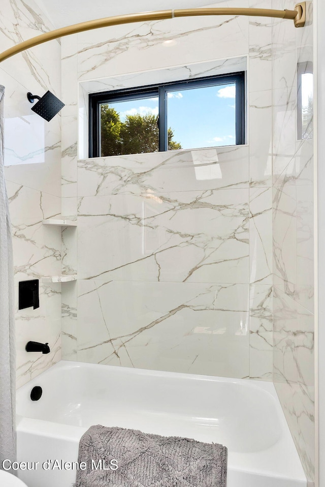 114 E Hattie, Coeur Dalene, ID 83814 - bathroom featuring healthy amount of natural light and bathtub / shower combination