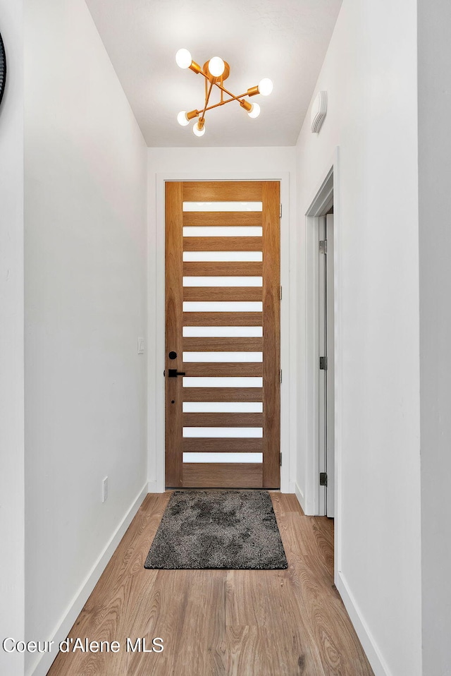 114 E Hattie, Coeur Dalene, ID 83814 - foyer entrance with a chandelier and wood finished floors