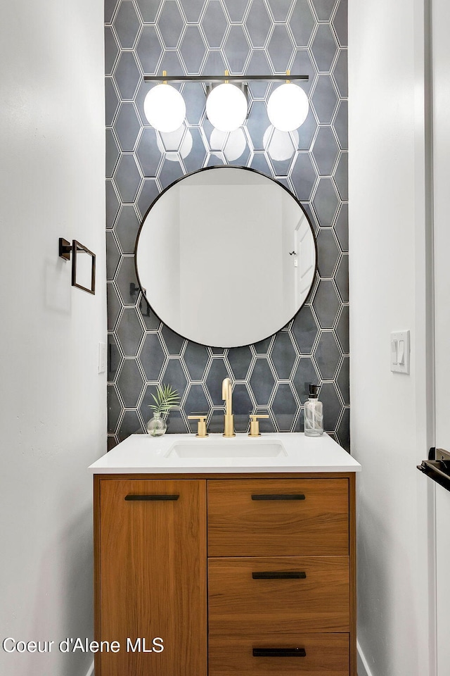 114 E Hattie, Coeur Dalene, ID 83814 - bathroom with vanity and tile walls
