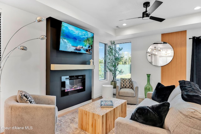 114 E Hattie, Coeur Dalene, ID 83814 - living area featuring a ceiling fan, a glass covered fireplace, light wood finished floors, and recessed lighting