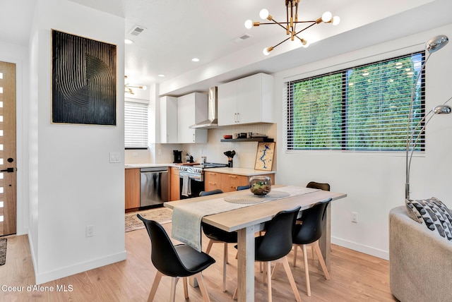 114 E Hattie, Coeur Dalene, ID 83814 - dining room with light wood-style flooring, a chandelier, and recessed lighting