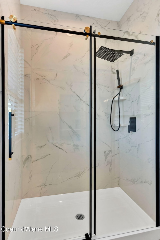 114 E Hattie, Coeur Dalene, ID 83814 - full bath with a marble finish shower