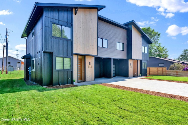 114 E Hattie, Coeur Dalene, ID 83814 - contemporary house with concrete driveway and a garage