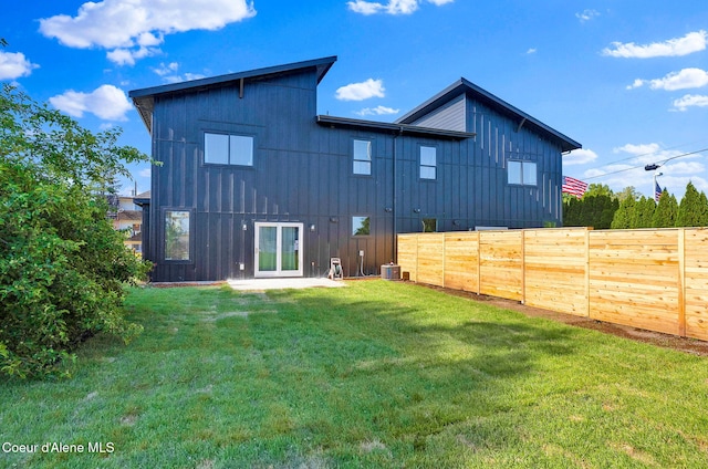 114 E Hattie, Coeur Dalene, ID 83814 - rear view of property with board and batten siding
