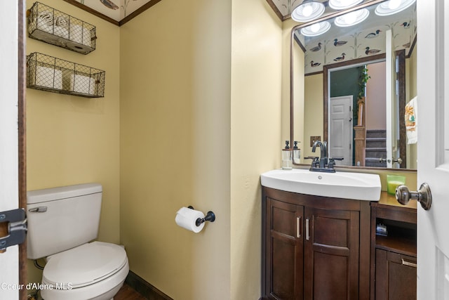 703 W Angus Ct, Post Falls, ID 83854 - bathroom featuring vanity and ornamental molding