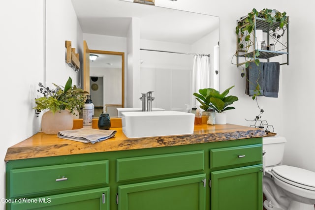 703 W Angus Ct, Post Falls, ID 83854 - full bathroom featuring vanity and a shower with curtain