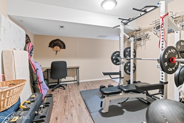 703 W Angus Ct, Post Falls, ID 83854 - exercise area featuring light wood-type flooring and baseboards