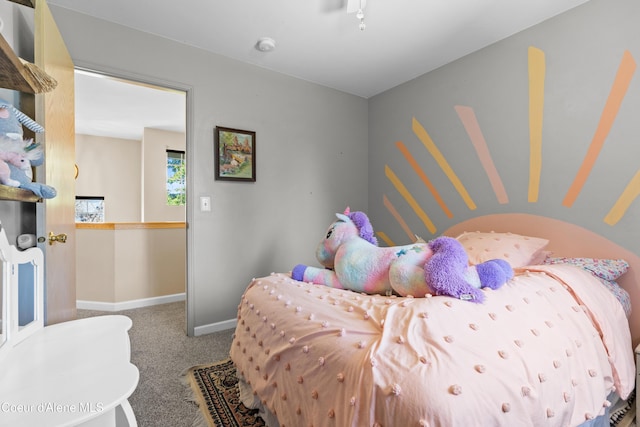 703 W Angus Ct, Post Falls, ID 83854 - carpeted bedroom featuring baseboards