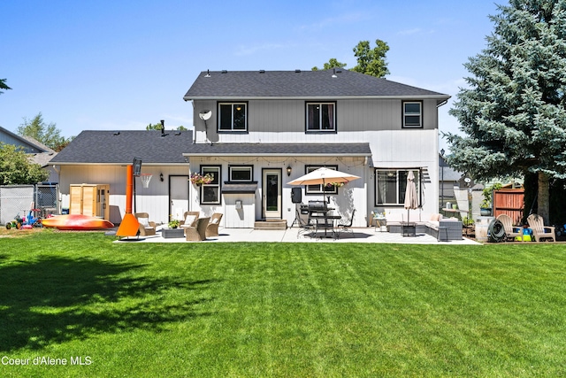 703 W Angus Ct, Post Falls, ID 83854 - back of house with an outdoor living space, a patio area, and entry steps