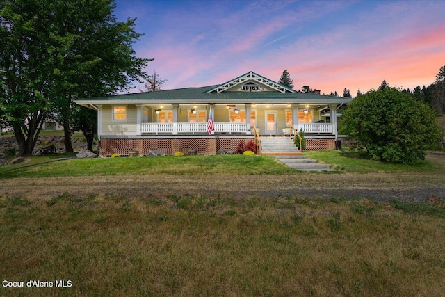 3297 Minaloosa Valley Rd, Plummer, ID 83851 - view of front facade with covered porch and a yard