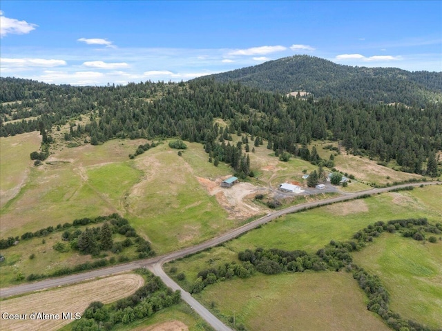 3297 Minaloosa Valley Rd, Plummer, ID 83851 - aerial view of property's location featuring a forest and a mountainous background