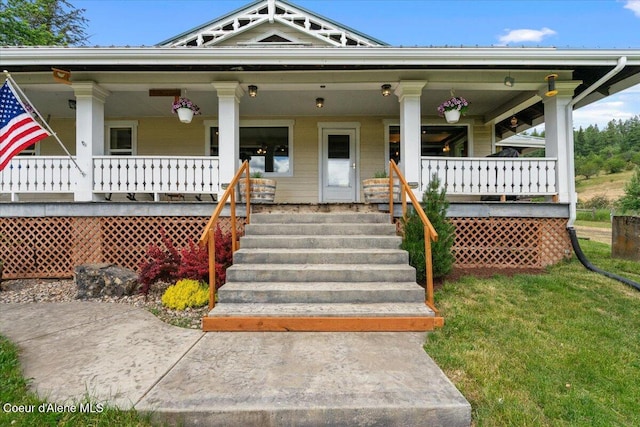 3297 Minaloosa Valley Rd, Plummer, ID 83851 - view of front facade with a porch and a front yard