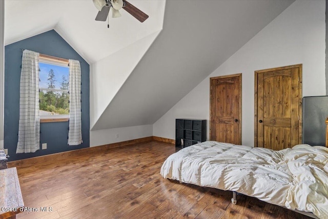 3297 Minaloosa Valley Rd, Plummer, ID 83851 - bedroom featuring lofted ceiling, wood finished floors, a ceiling fan, and multiple closets