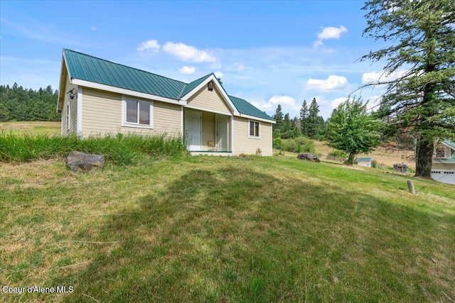 3297 Minaloosa Valley Rd, Plummer, ID 83851 - view of front of house featuring a front yard and a metal roof