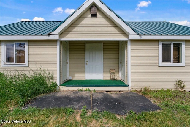 3297 Minaloosa Valley Rd, Plummer, ID 83851 - view of front of house featuring a metal roof and covered porch