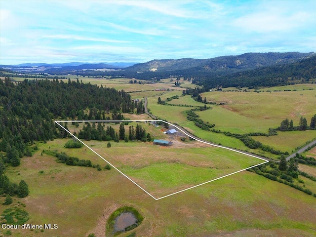 3297 Minaloosa Valley Rd, Plummer, ID 83851 - overview of rural landscape featuring property parcel outlined and mountains