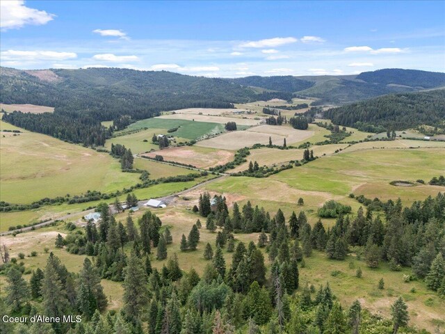 3297 Minaloosa Valley Rd, Plummer, ID 83851 - aerial view of property's location featuring a mountainous background and rural landscape