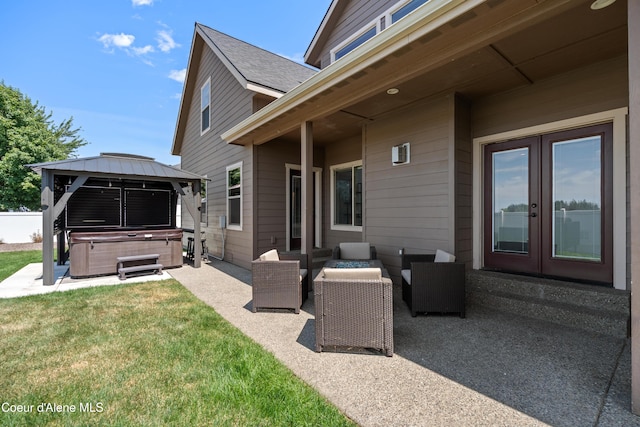 9433 N Justice Way, Hayden, ID 83835 - view of patio / terrace with a hot tub, french doors, a gazebo, and an outdoor hangout area