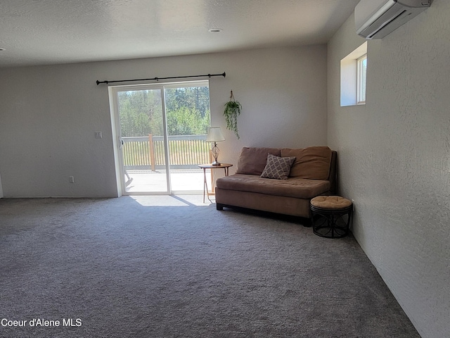 29222 N 1st St, Athol, ID 83801 - living area featuring a wall unit AC, healthy amount of natural light, carpet floors, and a textured wall
