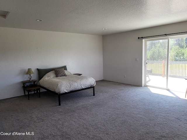 29222 N 1st St, Athol, ID 83801 - bedroom featuring access to outside, carpet, and a textured ceiling